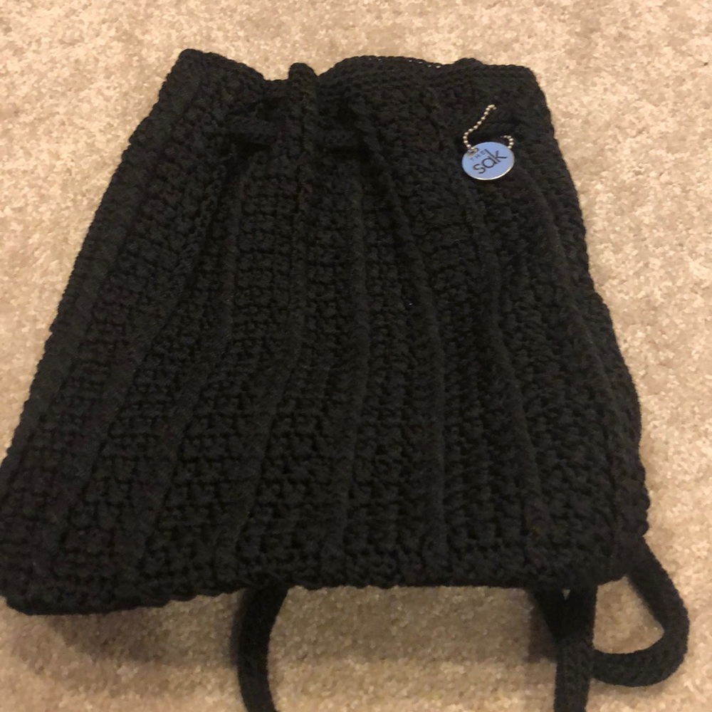 Black crocheted mini backpack style bag